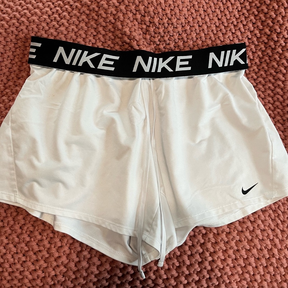 white nike shorts